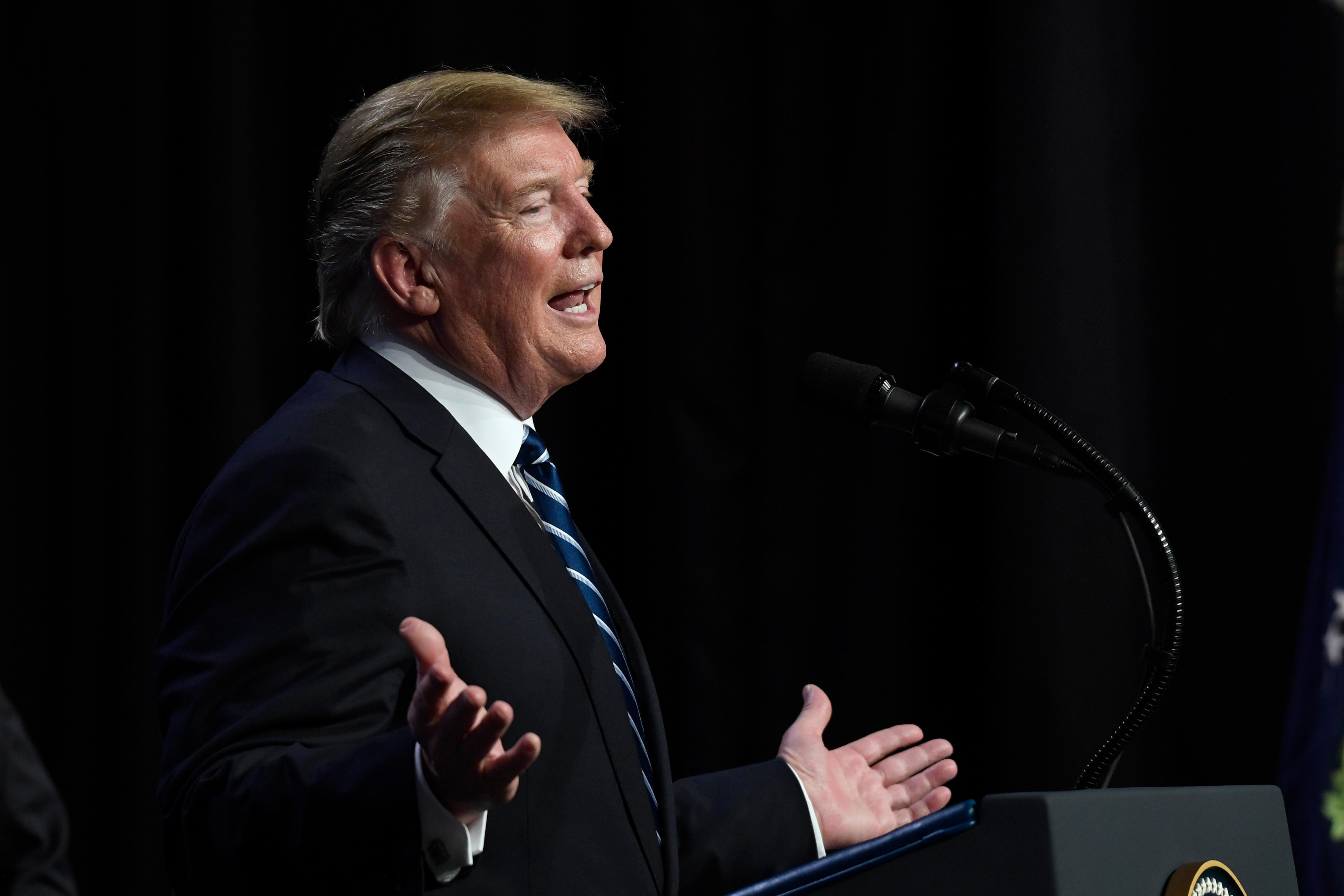 president donald trump speaks during a news conference in hanoi