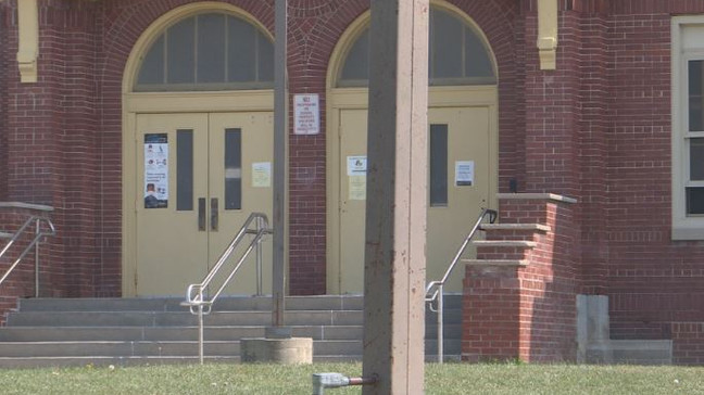 How temperature checks will be done in CNY's largest school district